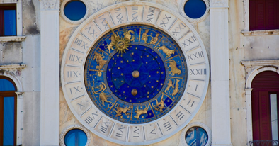 blue and gold zodiac wheel